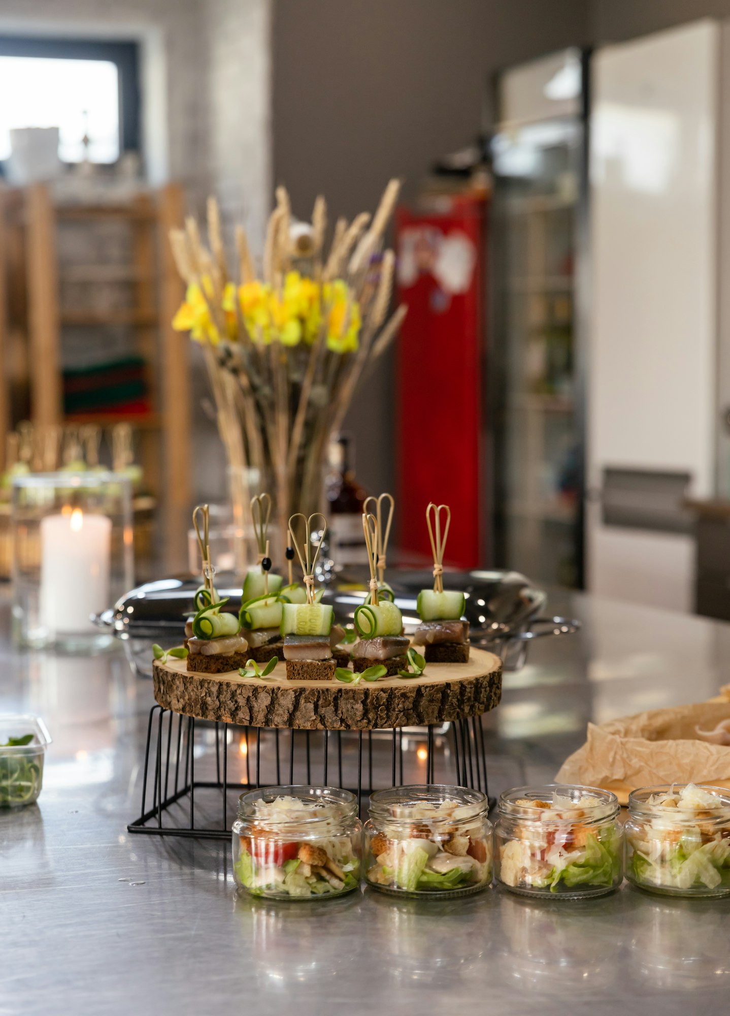 Mini canapes on rye bread with cucumber and herring. Catering. Buffet table for banquet event.
